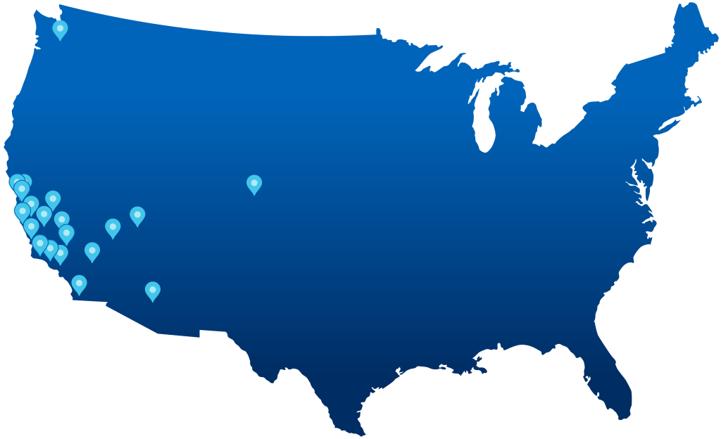 a map of the united states with blue pins